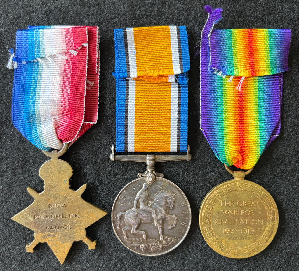 WW1 medal group – 1914-15 Star, British War Medal & Victory Medal - awarded to Private ARTHUR SINGLETON of the Royal Lancaster Regiment – Wounded Second Battle of Ypres