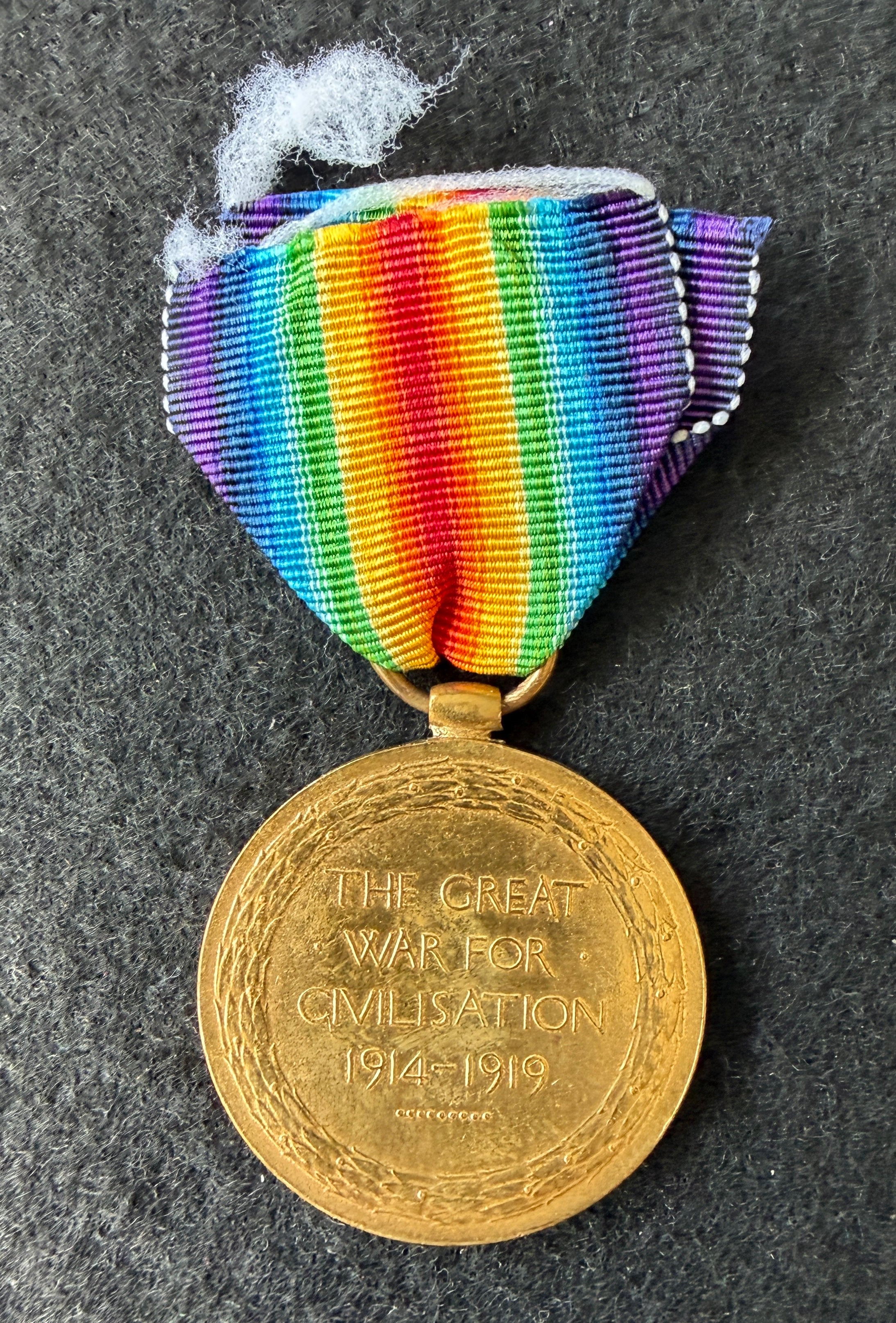 WW1 Victory Medal (Single medal only) – Awarded to Private HERBERT MALCOLM BACON of the Queen’s Regiment (Royal West Surrey), later Labour Corps