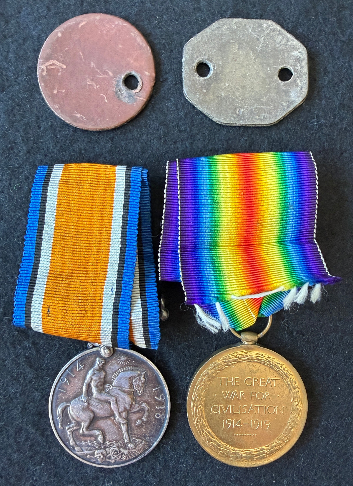 WW1 medal pair & ID discs (Dog Tags) – British War Medal & Victory Medal – Awarded to JAMES RUSSELL of the Loyal North Lancashire Regiment, along with 2 x identification discs (Dog Tags) in the name J RUSSELL