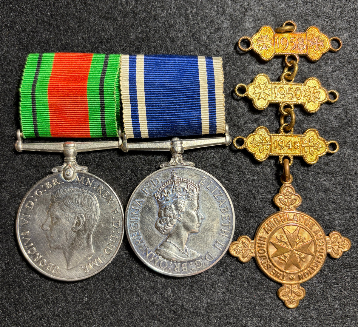 POLICE medal group – Defence Medal, West Riding Constabulary Police Long Service & Good Conduct Medal, St John Ambulance Association Medal + re-examination bars & West Yorkshire Police Retirement Medal awarded to Police Constable DAVID TODD JACQUES
